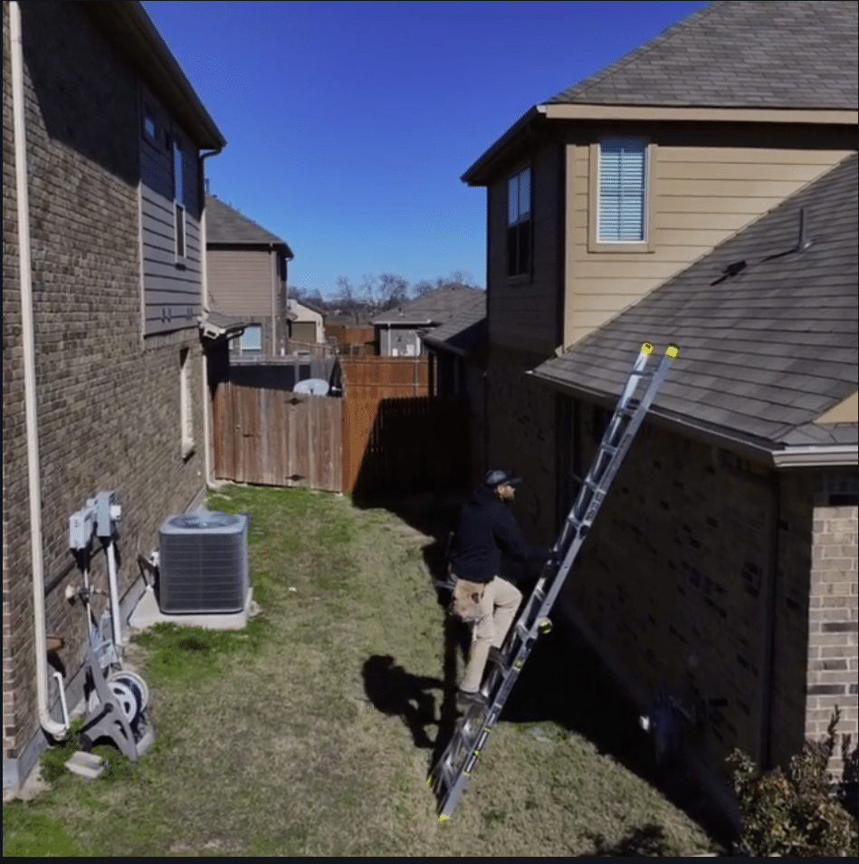 Sales representative doing a roof inspection